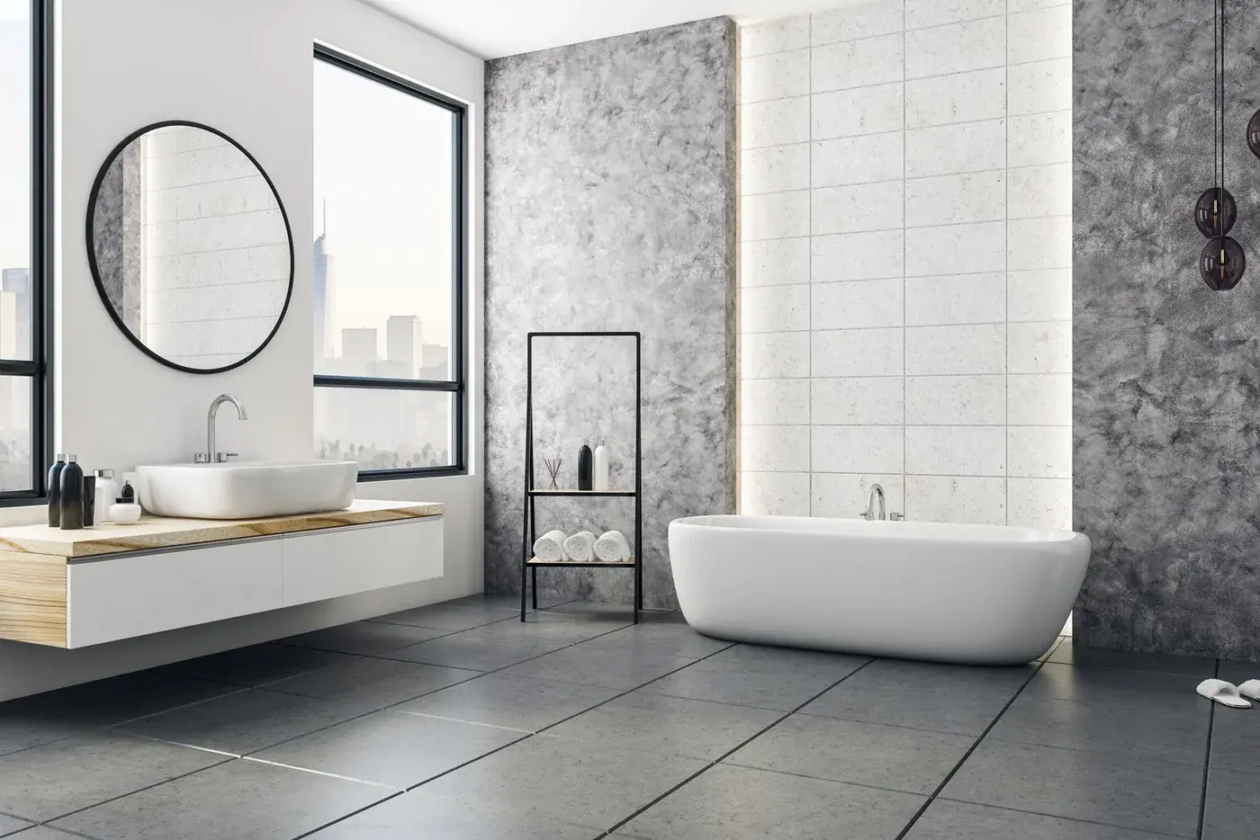 Bathroom with a textured stone feature wall, floating vanity and freestanding bath